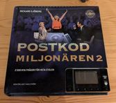 Postkodmiljonären! Nytt med inplastad display.