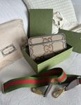 Gucci Maxi GG Mini canvas crossbody bag