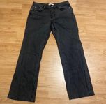 Svarta lågmidjade jeans från NA-KD, storlek 38