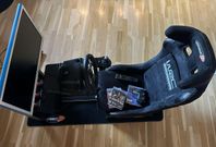 Playseat WRC-stol med Logitech G27, PS3-konsol, skärm, spel