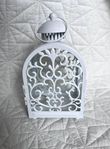 Elegant White Metal Lantern with Ornate Filigree Design