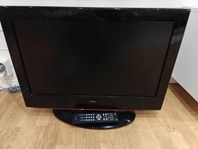 26" äldre TV med enklare väggfäste och fjärrkontroll