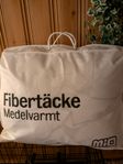 Fiber täcke