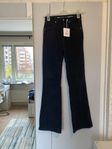 Flare bootcut svarta högmidjade jeans från BikBok 