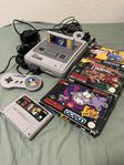 Super Nintendo + spel *Mario & Donkey Kong*