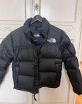 Svart pufferjacka fran The North Face