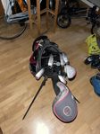 Golfbag med klubbor 