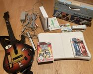 Nintendo Wii konsol + Wii sports pack + Guitar Hero+ Skate