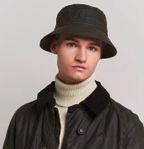 Barbour, bucket hatt i vaxad bomull. Olivbrun. S-M Unisex. 