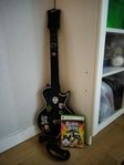 Guitar hero spel+gitarr  Xbox  360