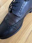 J Lindeberg brogue, Oxfordskor