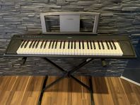 El Piano Yamaha med stativ!