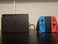 Nintendo Switch OLED med spel och tillbehör