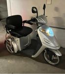 Eloped / Promenadscooter / Permobil