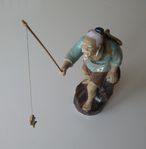 Vacker China figur:  Fiskare