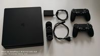 PlayStation 4 (1 TB) med tillbehör och spel