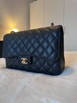 chanel flap bag large oanvänd 