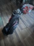 golfset vänster samt golfvagn