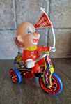 PLÅTLEKSAK Korea 1950-tal - Cyklande clown (FUNGERAR)