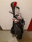 golfbag med klubbor 