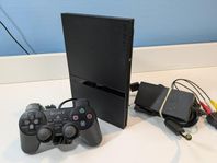 Playstation 2 slim med en handkontroll. Funktionstestade!