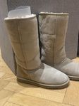 Höga vita/beiga uggs 