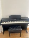 Piano Roland RP501R med stol