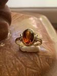 18k red gold ring with a rare natural orange/brown Sapphire 