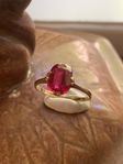 18k red gold ring with a rare natural pink Spinel.