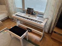 Piano Yamaha Portable Grand DGX-650