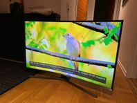 tv apparat med fot och 4k 