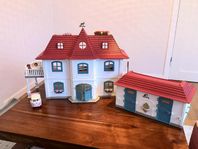 Dockhus med stall (Schleich)