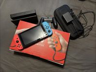 Nintendo Switch + fodral + kartong