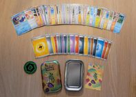 Pokemon Mini Tin med 61 kort och coin