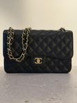 Chanel Classic jumbo - black caviar with gold hardware