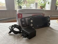 Nintendo Switch Lite ink. 128GB minneskort samt Travel Case