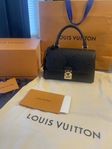 Louis Vuitton Madeleine Bag