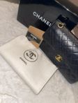 CHANEL Classic Medium Caviar Double Flap Bag