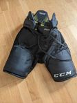 Svarta hockeybyxor, CCM Tacks, storlek JR S ( 132-142cm)