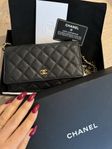 Chanel Wallet on Chain WOC i svart caviarläder (nyskick)