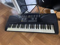 piano med notställ