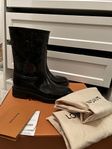 Louis Vuitton drops flat half boots 