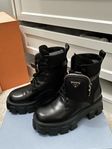 Prada monolith boots with pouch