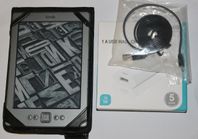 Kindle D01100 i fint skick + fodral & laddadapter