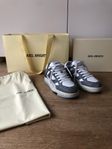 Oanvända Axel Arigato Area Lo Sneaker Grey stl 39 