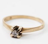 RING 18 k rodierat vitguld, briljant 0,08 ct