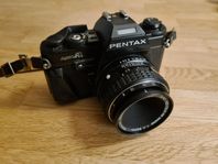 Pentax super A1 med 2 objektiv och blixt