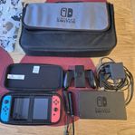 nintendo switch med resväska och minnes kort