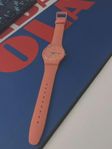 swatch klocka ORANGY PINK REBEL