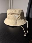 The North Face beige bucket hat